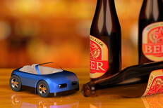 Blue car with beer bottles Small blue toy car with beer bottles on bar concept for DUI or drunk driving