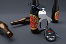 Car keys cuffed to a beer bottle Car keys handcuffed to a beer bottle DUI arrest concept image