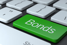 Keyboard with Bonds key Laptop keyboard with large green Bonds key concept for buying bonds online
