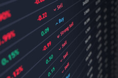 Stock ticker view from above Stock ticker screen showing price, percent change, and buy sell recommendations