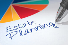 Estate planning pie chart Colorful pie chart on paper with ballpoint pen writing Estate Planning beneath