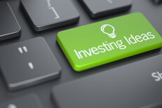 Investing Ideas keyboard key Computer keyboard with large green Investing Ideas key concept