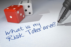 Risk Tolerance dice Dice on paper with pen writing What is my Risk Tolerance