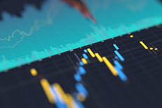 Stock price charts blurred Shallow depth of field view of stock price area chart and candlestick chart