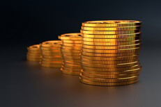 Column chart stack of gold coins on dark background showing value increase or compound interest