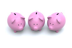 Three pink piggy banks representing investment choices