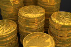 Close-up photo of stacks of U.S. gold coins