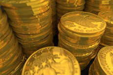 Gold coin stacks Close-up image of U.S. gold coins representing wealth, savings, or extreme wealth