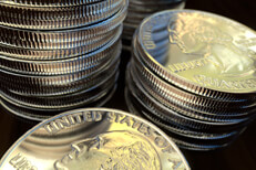 Close up of quarter stacks Close up photo of different size stacks of shiny U.S. quarters