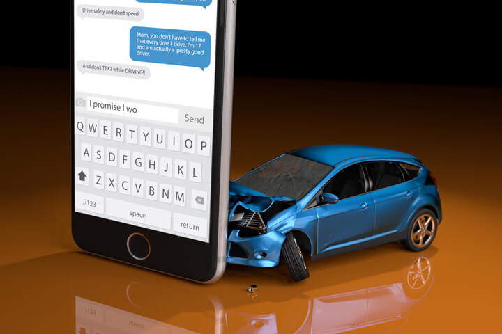 Blue compact car crashed into upright cell phone concept for texting while driving or distracted driving