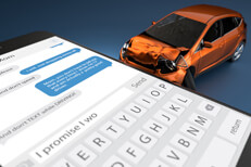 Texting while driving accident concept Side view of accident damage from car crashing into large cell phone